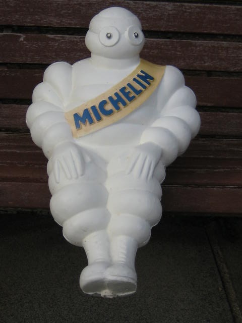 Click the image for more info MICHELIN MAN SITTING DOWN MICHELIN